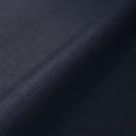Close-up of navy blue textured linen fabric.