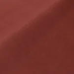 Close-up of red curtains with black ring hooks