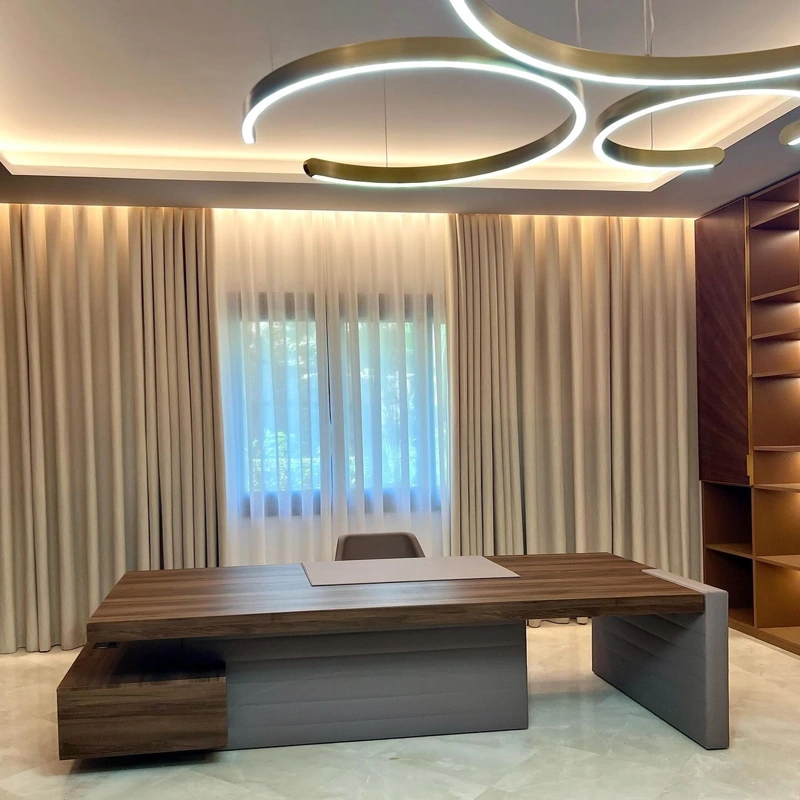 Large modern wood desk with a unique ring chandelier